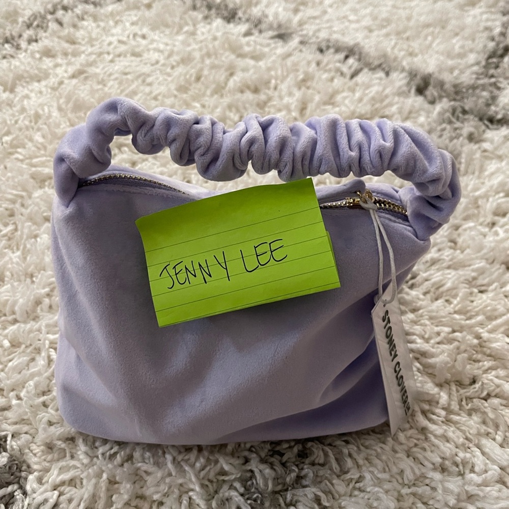 Brand NEW scrunch hand bag in purple velvet material
